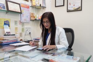 Dr Mugdha Raut carefully evaluating IVF reports
